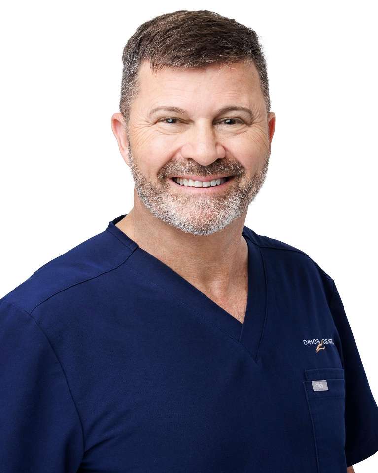 Headshot of Dr Chris Dimos at dental clinic in Melbourne
